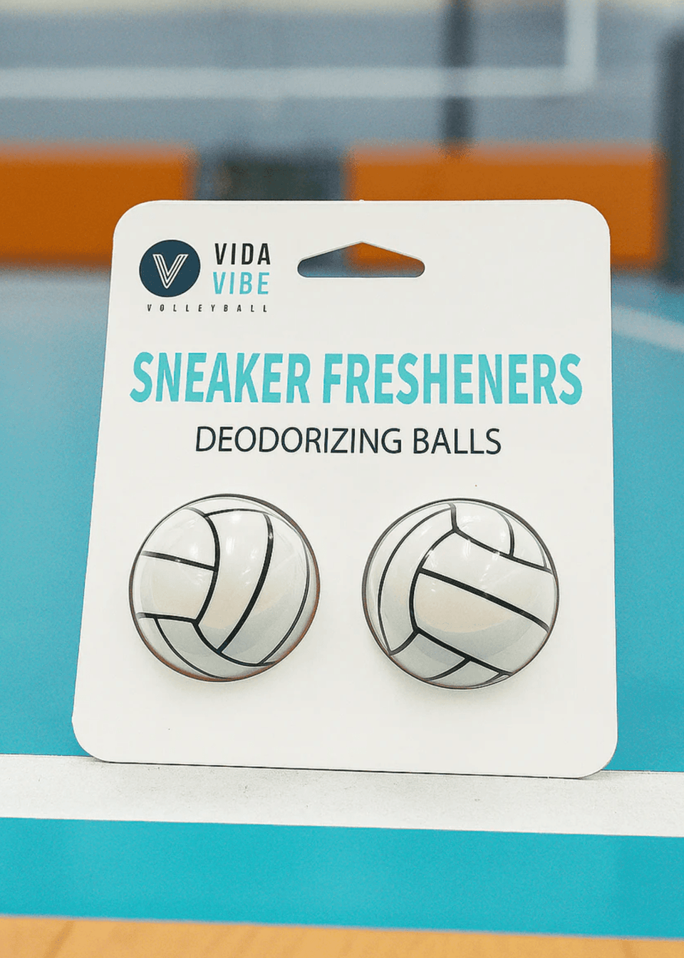 Vida Vibe sneaker fresheners with volleyball design on a blue background